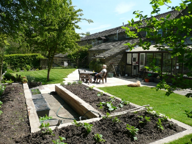 Oak Sleeper Raised Planter and Indian Sanstone Paving