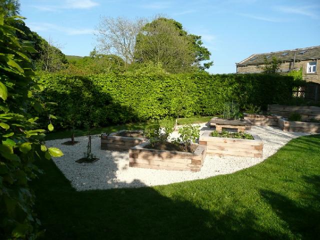 Oak Sleeper Raised Planters and Gravel Garden.