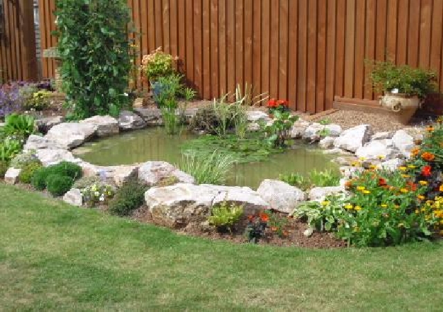 Pond After Landscaping Using Stoneycombe Limestone.