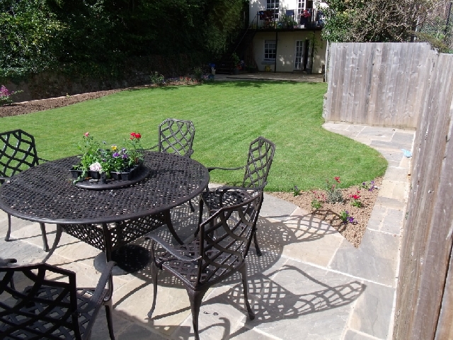 Circular 'Dartmoor Grey' Patio with BBQ Area.