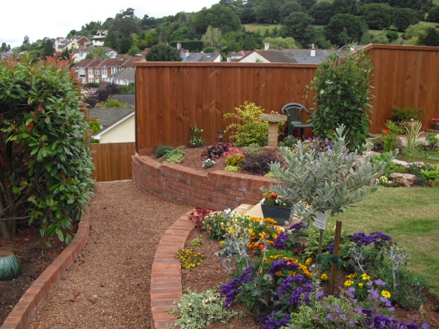 pea gravel path and raised flower beds